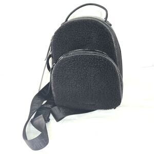 Calvin Klein Astatine Sherpa Mini Backpack in Black